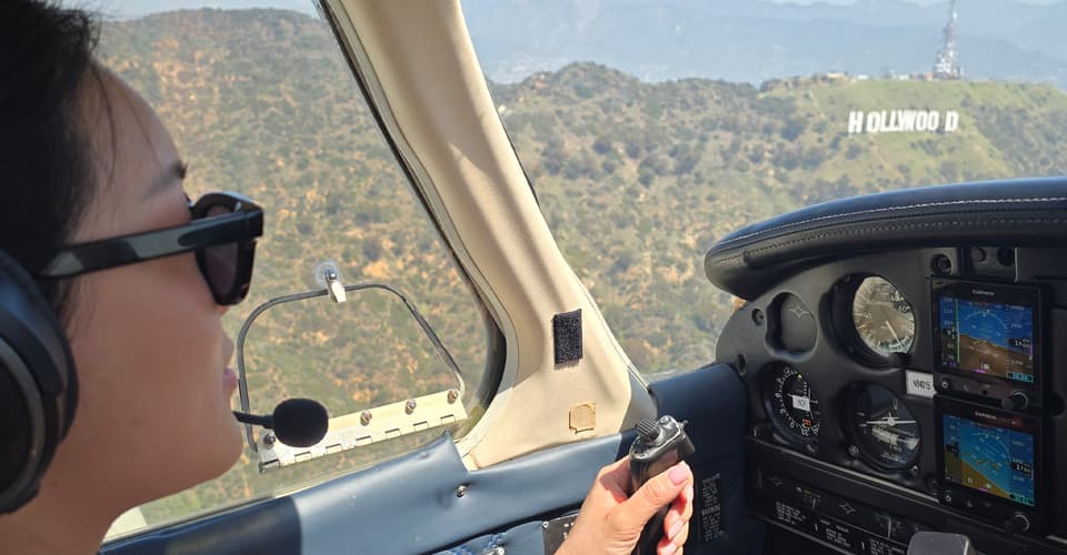 Pilot flying past the Hollywood Sign
